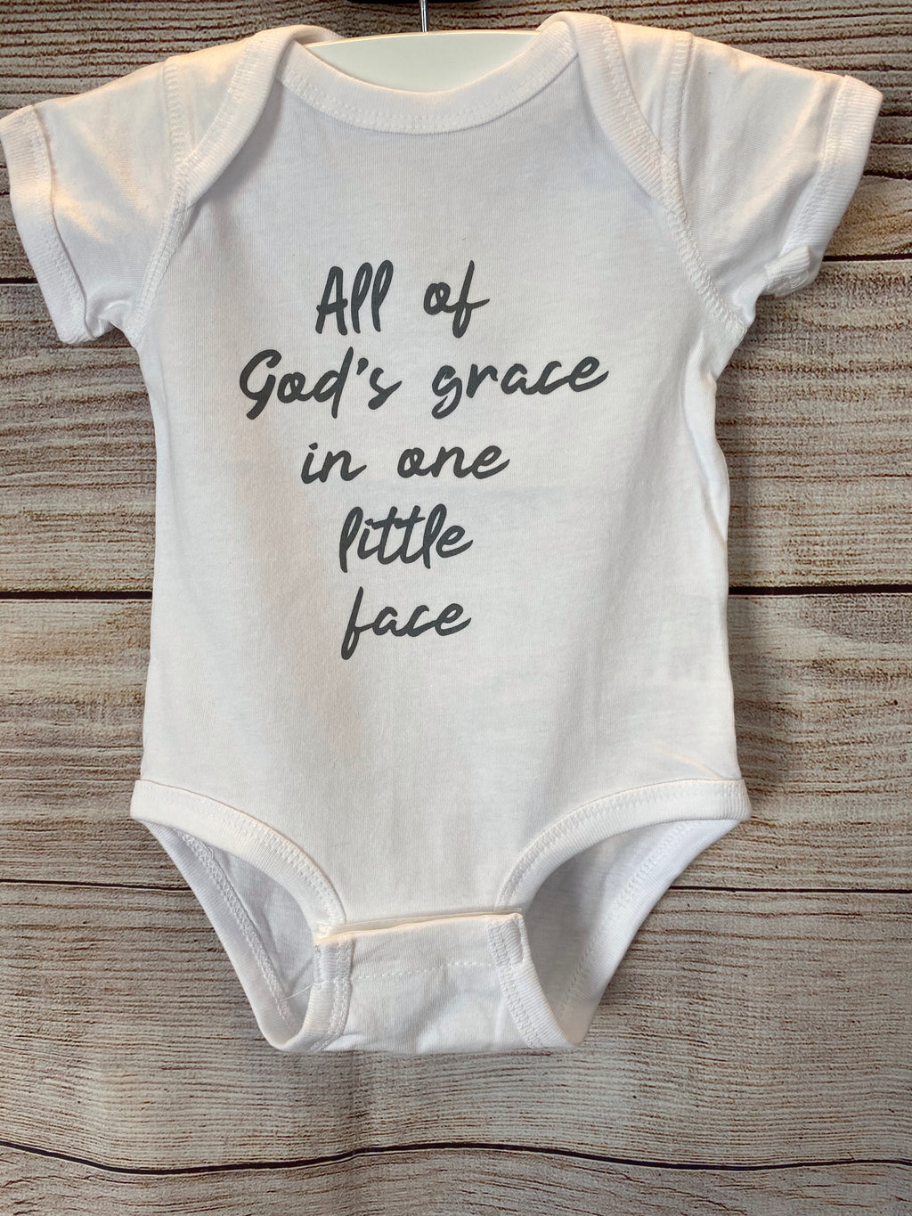 All Of God's Grace In One Little Face Baby Onesie
